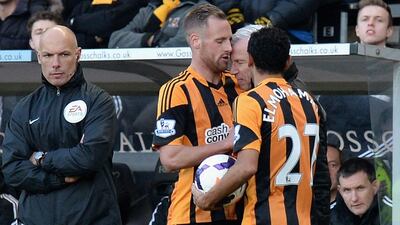 David Meyler of Hull City clashes with Alan Pardew, Manager of Newcastle United at KC Stadium on Saturday March 1, 2014. Tony Marshall / Getty Images