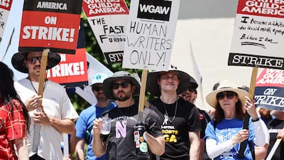 Striking Writers Guild of America workers picket outside Paramount Studios. Getty via AFP