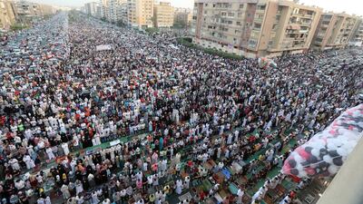 Thousands gather outside Al Seddik Mosque in Cairo, Egypt. EPA