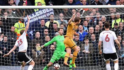 Harry Kane, second from right, scored a hat-trick against Fulham on Sunday. Glyn Kirk / AFP