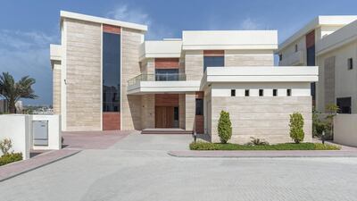 The frontage of the villas features contemporary architecture. Courtesy LuxuryProperty.com