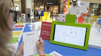 Shoppers at some of Dubai’s biggest malls will be able to try their hand at a life-size version of the popular board game Pictionary. Antonie Robertson / The National