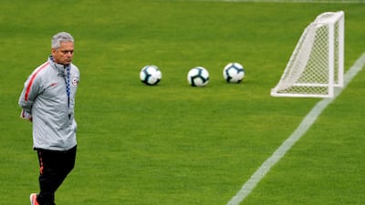 Chile coach Reinaldo Rueda, centre, leads a training session in Sao Paulo. EPA