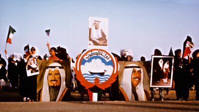 A demonstration in Kuwait, following the country's invasion by Iraq at the start of the Gulf War, 4th-6th August 1990. In the centre is the Emblem of Kuwait, adopted in 1962. Getty