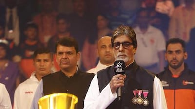 Amitabh Bachchan sings the Indian national anthem on the inaugural session of Pro-Kabaddi League 2015 in Mumbai, India, on Saturday, July 18, 2015. Rajanish Kakade / AP Photo
