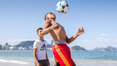 Hafeth Al Mohammed shows of his newly honed football skills on the beach. Courtesy Viva Rio