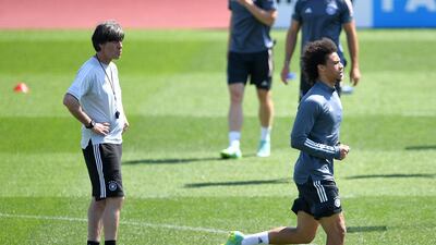 Germany manager Joachim Low with Leroy Sane during training. Reuters