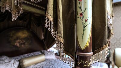 The pillars of the bed have been hand-painted by King Farouk's furniture-maker Pasha Hussein Al Atrabi.