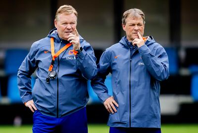 Netherlands manager Ronald Koeman, left. EPA