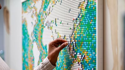 One of the UN resolution's main points is that people should know that no single map can perfectly show the curved surface of the Earth on a flat page. Lego