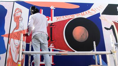 The artists worked with the team from consulting agency Art Painting Lab to complete the work. Reem Mohammed / The National