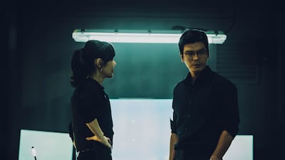 Kim Yun-jin as Seon Woo-jin, left, and Kim Seung-o as Cha Moohyuk in 'Money Heist: Korea - Joint Economic Area'. All photos: Netflix