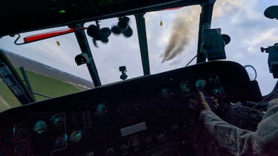 A Ukrainian helicopter fires at Russian positions in Kherson. AP