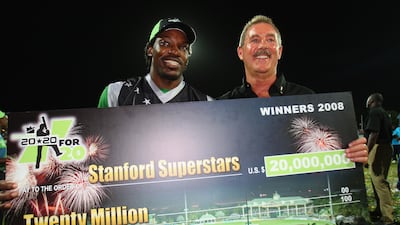 Sir Allen Stanford, who invested heavily in promoting cricket, poses with Chris Gayle of the Stanford Superstars in Antigua in 2008. Getty Images