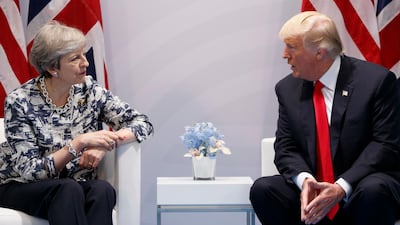 British Prime Minister Theresa May and US President Donald Trump met when he visited the UK last July. AP