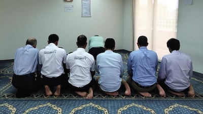 Day 3 — ‘Our office has makeshift prayer rooms set-up during Ramadan. In this picture my colleagues are performing the Duhr prayer. With the reduced working hours, the rooms are not used for all prayer times’. Ammar Al Attar for The National