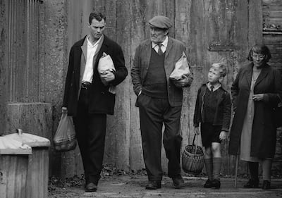 Actors, from left, Jamie Dornan, Ciaran Hinds, Jude Hill and Judi Dench in 'Belfast'. AP