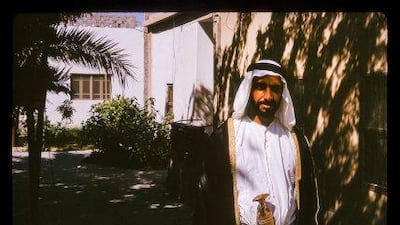 Sheikh Zayed at Qasr Al Hosn in the shade of palm trees, 1966. All photos: Nick Cochrane-Dyet