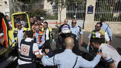 Israeli medics move the Palestinian girl Norhan Awwad, 14, who was shot in Jerusalem yesterday. Sebastian Scheiner / AP Photo