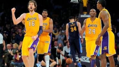 On a night when Kobe Bryant, second from the right, was quiet, Pau Gasol, left, made the most noise for the Lakers, who overcame the Denver Nuggets and will now face the Oklahoma City Thunder in the conference semi-final round.