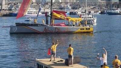 Abu Dhabi Ocean Racing's sailors cheer as they arrive to Table Bay at Cape Town, South Africa, to win the first leg of the Volvo Ocean Race, after sailing from Alicante in Spain, on Wednesday. Rodger Bosch / AFP