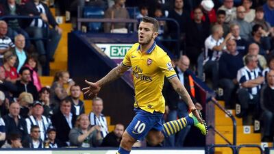 Jack Wilshere celebrates after scoring the equaliser for Arsenal in their match against West Bromwich Albion. David Jones / EPA
