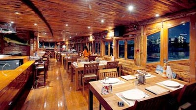 Aprons & Hammers is located in a cosy converted dhow, with wood panelling and fishing nets.