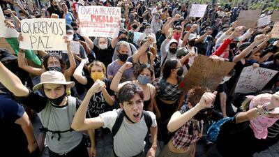 People demonstrate to demand justice for the death of young construction worker Giovanni Lopez while in police custody after he had been arrested for allegedly failing to comply with measures against the coronavirus, in Guadalajara, Jalisco State, Mexico. AFP