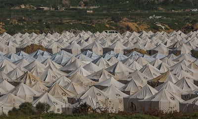 Palestinians prepare a camp to shelter displaced people in the Netzarim area, located between the southern part of Gaza City and the central Gaza Strip, 17 January 2026. EPA