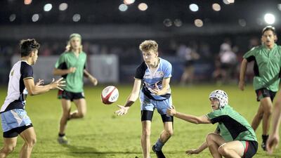 BSAK players takes on the Al Yasmina defence in the U19 boys clash at the HSBC Rugby Sevens in Decemberi. Chris Whiteoak / The National