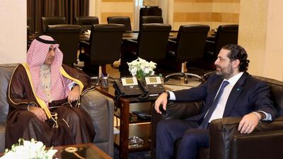 Lebanese Prime Minister Saad Hariri meets Saudi royal court envoy Nizar Al Aloula at the government palace in Beirut on February 13, 2019. Dalati Nohra via AP