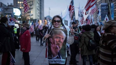 A pro-Trump supporter in Seoul, South Korea. AFP
