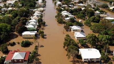 Raging Australian floodwaters have claimed their second official fatality, after the body of a man whose boat was swamped in central Queensland was found.