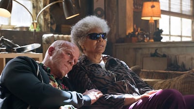 Ryan Reynolds, left, and Leslie Uggams in a scene from "Deadpool 2."