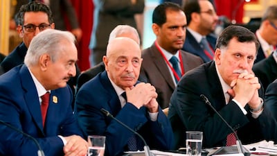 Libyan Field Marshal Khalifa Haftar, House of Representatives speaker Aguila Saleh, and GNA Prime Minister Fayez Al Sarraj attend a peace conference hosted by France in May 2018. AFP