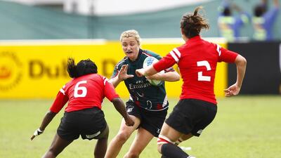 With the growth of rugby in the region there are more opportunities for female athletes to play the sport such as at this Dubai Rugby Sevens match between UAE Women and a Canadian team, in red, at The Sevens stadium, Dubai in November 2012. Jake Badger for The National