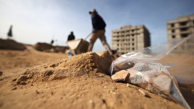 A set of bones and artefacts from one tomb were dated back to the second century, Hamas said. AFP