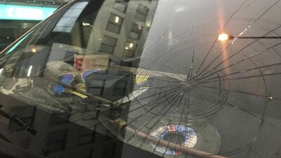 A cracked windshield from hail damage is seen in Sydney, Australia. AAP / Brendan Esposito / via Reuters
