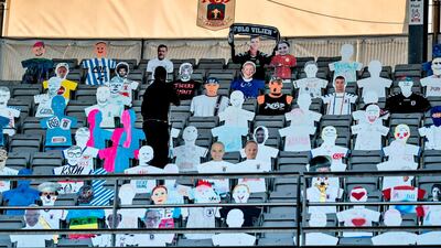 Cardboard cut-out of fans are seen in the stands during the 3F Super League football match between AGF and Randers FC. AFP