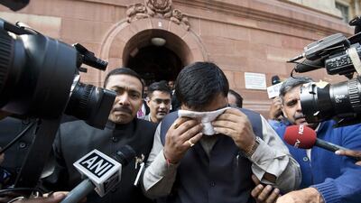 A reader says activities of some of the MPs in Indian parliament have brought shame to the country. Prakash Singh / AFP