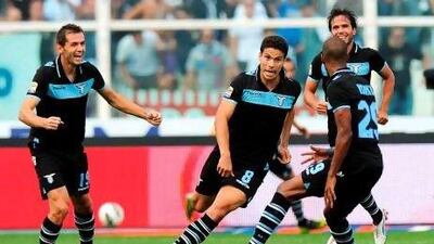 Lazio's Hernanes, centre, scored his fourth goal of the Serie A campaign against Pescara. Ettore Ferrari / EPA