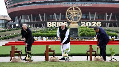 From left, Mr Putin, Mr Modi and Mr Xi at a joint banyan tree-planting ceremony. EPA