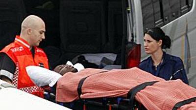 Togo's reserve soccer goalkeeper Kodjovi Obilale arrives on a stretcher at Lanseria airport after being evacuated to Johannesburg for medical treatment.
