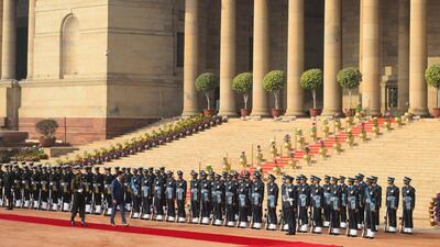 Mr Trudeau takes part in a welcoming ceremony held in his honour outside the Indian Presidential Palace. Sean Kilpatrick / The Canadian Press via AP