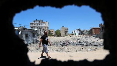 Ibrahim Dwedar helped to rescue Mr Shahin's horses after an Israeli air strike on Gaza. Reuters