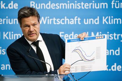 Vice Chancellor Robert Habeck holds up a graph showing potential gas shortages in winter. EPA