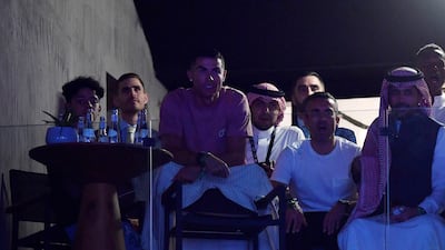 Al Nassr and Portugal striker Cristiano Ronaldo attends the boxing match between Tommy Fury and Jake Paul at Diriyah Arena, Saudi Arabia, February 27, 2023. Reuters