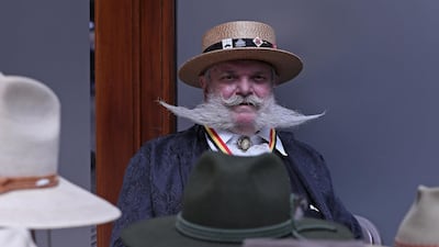 A participant of the international World Beard and Moustache Championships poses before taking part in one of the 17 categories of beard and moustache styles competing in Antwerp, Belgium. Reuters