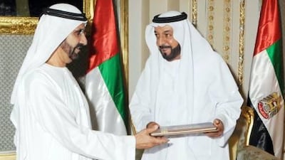 Sheikh Khalifa, President of the UAE, receives the Dubai International Holy Quran Award for Islamic Personality of the Year from Sheikh Mohammed bin Rashid, Vice President of the UAE and Ruler of Dubai.
