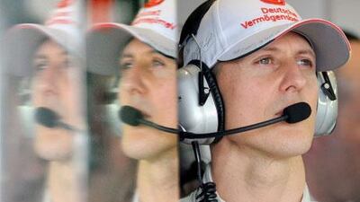 Michael Schumacher put his Mercedes GP Formula One car at the top of the time sheets after Friday's practice sessions for the season-opening Australian Grand Prix was shortened due to rain.